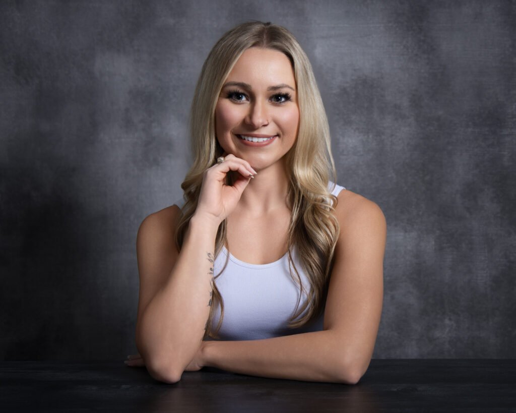 A professional business headshot of a professional woman.