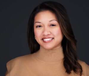 Team Headshot of a beautiful young lady