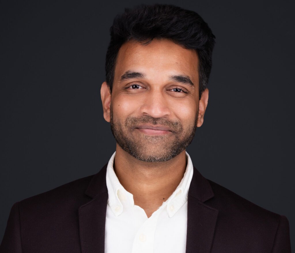 A picture of a young professional from a group headshot session | 2mm Headshots and Event Photography Dallas Corporate Headshot