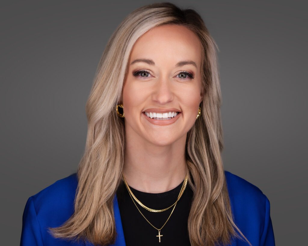 A professional headshot near you of a professional business woman.