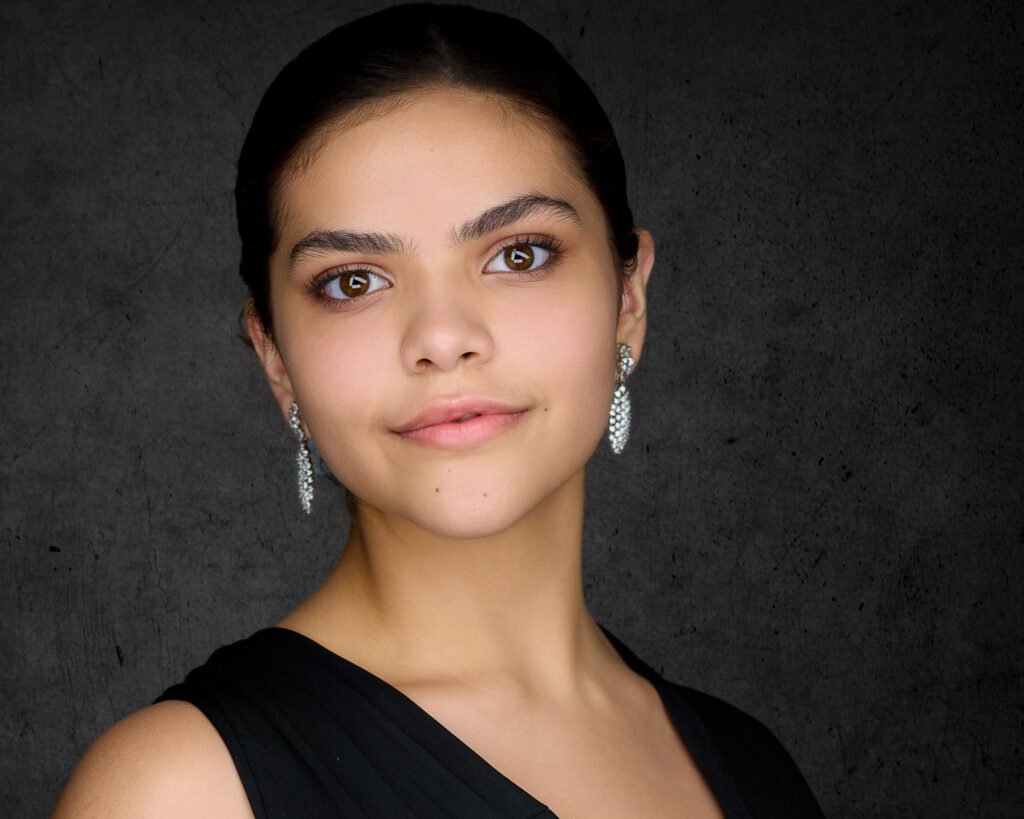 Headshot of a young actress in a black dress - 2mm Headshots & Event Photography Professional Headshots That Show Confidence
