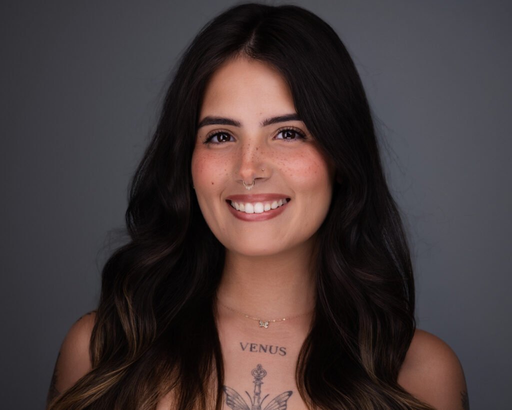 Girl with a tattoo's headshot