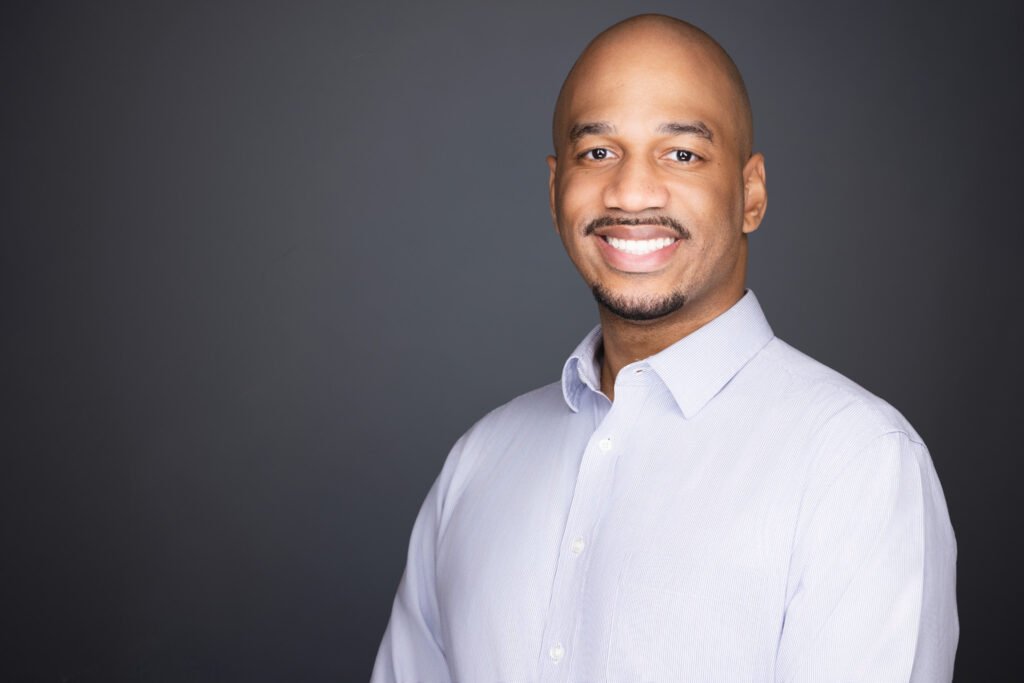 Executive and leadership team headshots on consistent uniform background