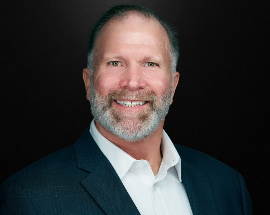 Professional headshot of a Southlake executive using the 2mm expression coaching method.